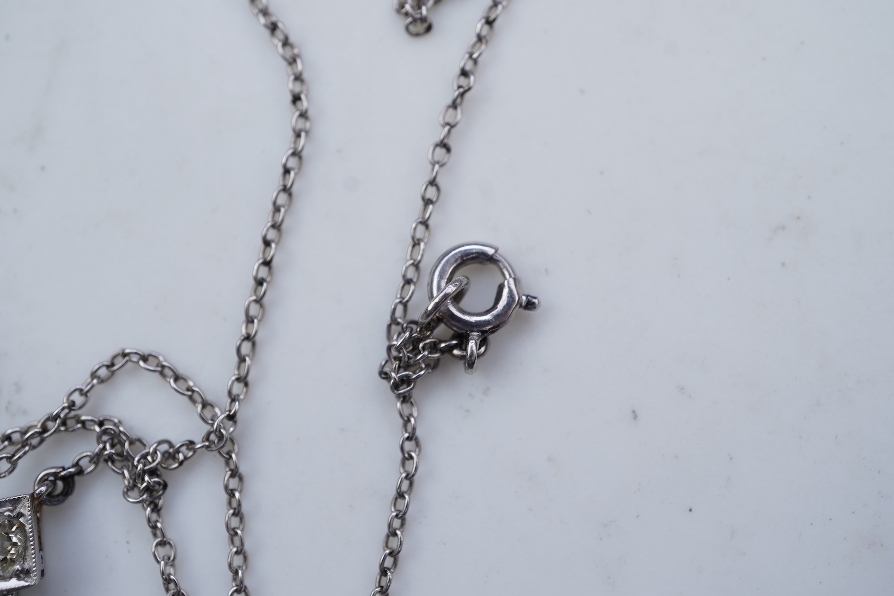 An Art Deco diamond pendant, 1930s and later